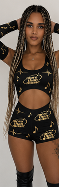 Model wearing a black More Than Music logo-print crop top and shorts