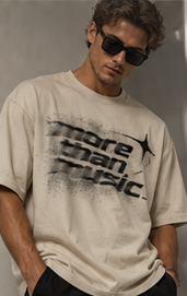 Model wearing a cream T-shirt with a black distorted More Than Music chest graphic